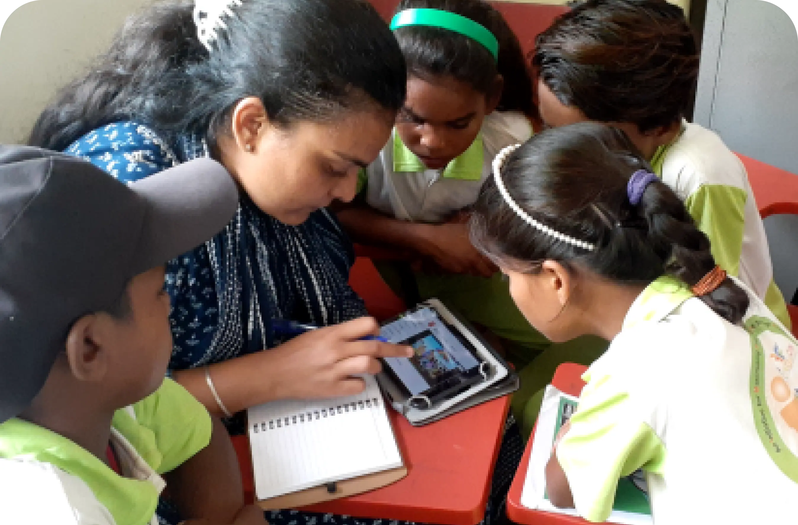 An image showing teachers and students actively engaging with the PAL Lab in schools for personalized adaptive learning experiences