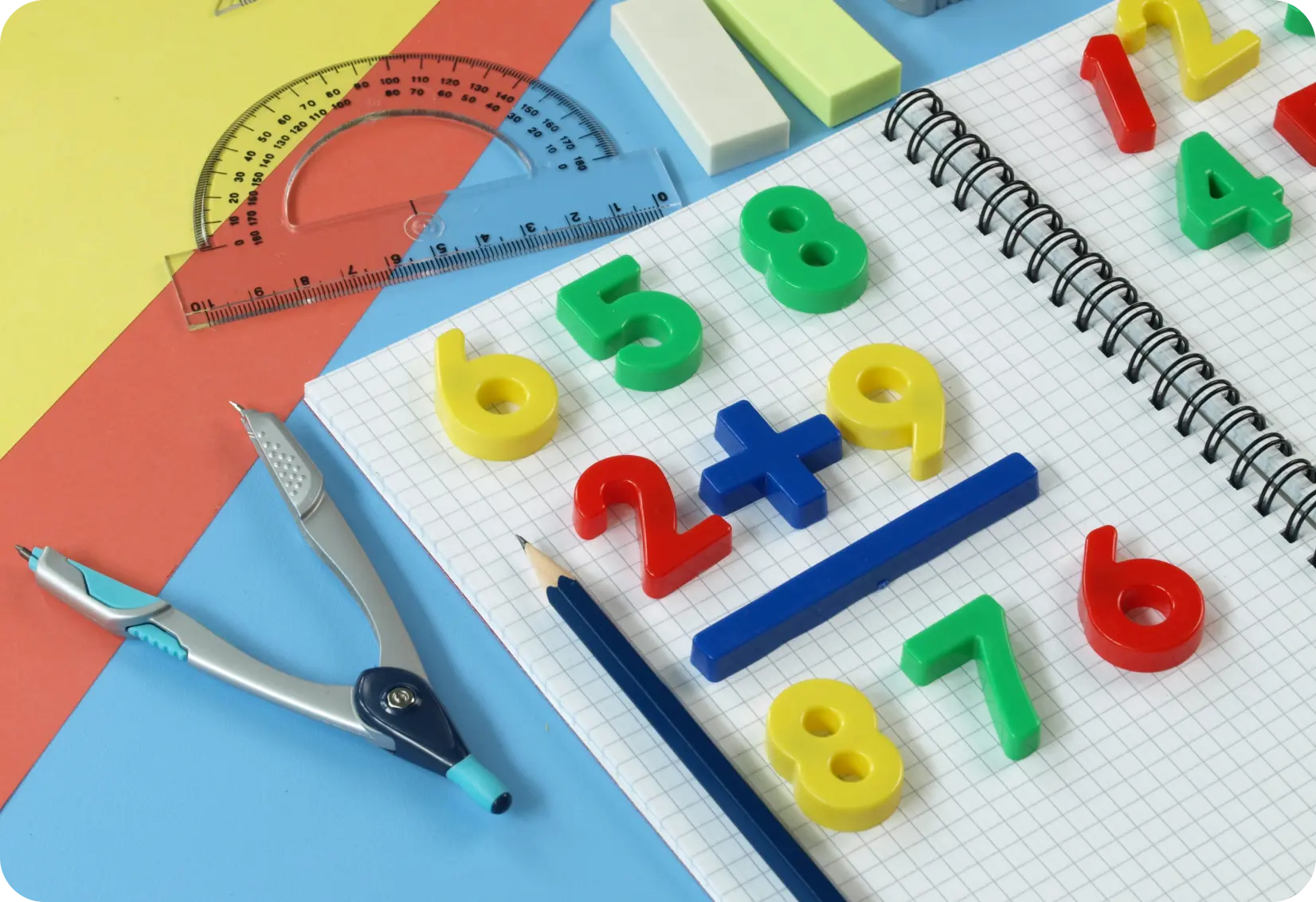 A visual representing the elements of maths lab for schools including numbers, dividers, rulers, etc